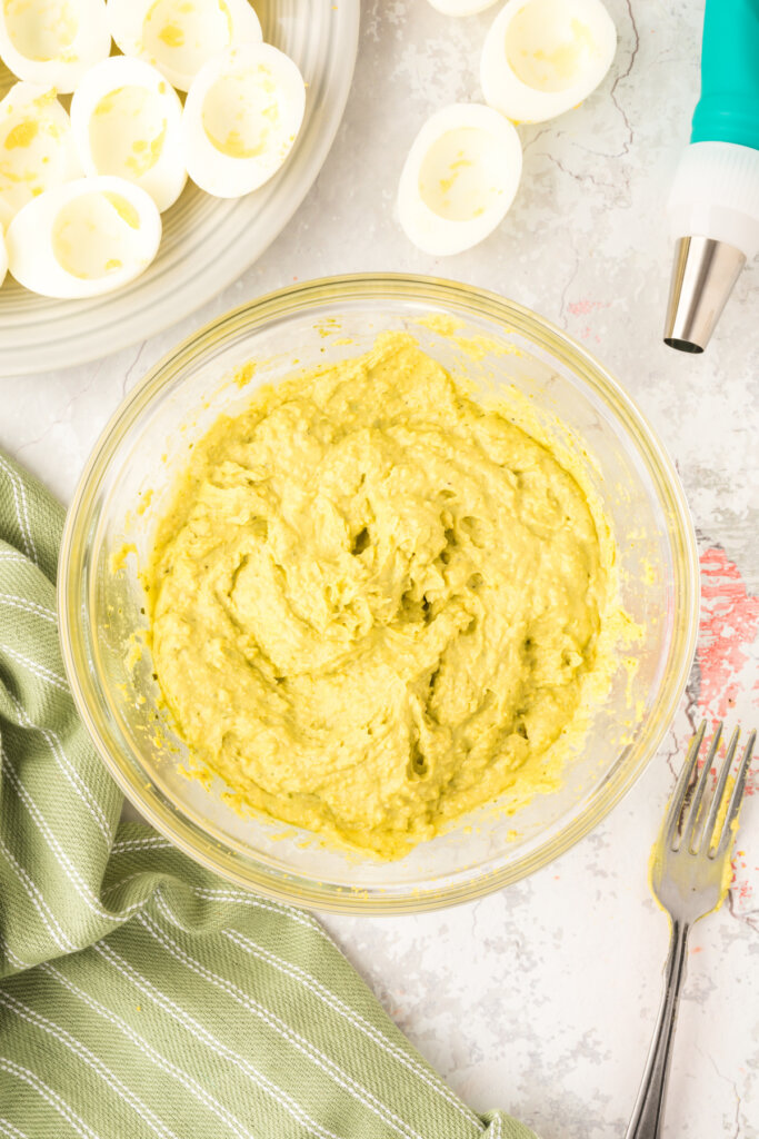 yolk mixture after mayo and pesto is stirred in.