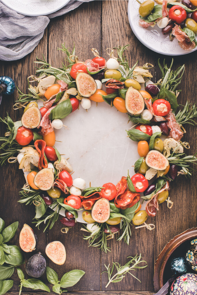 antipasto wreath on dark wooden table ready to serve