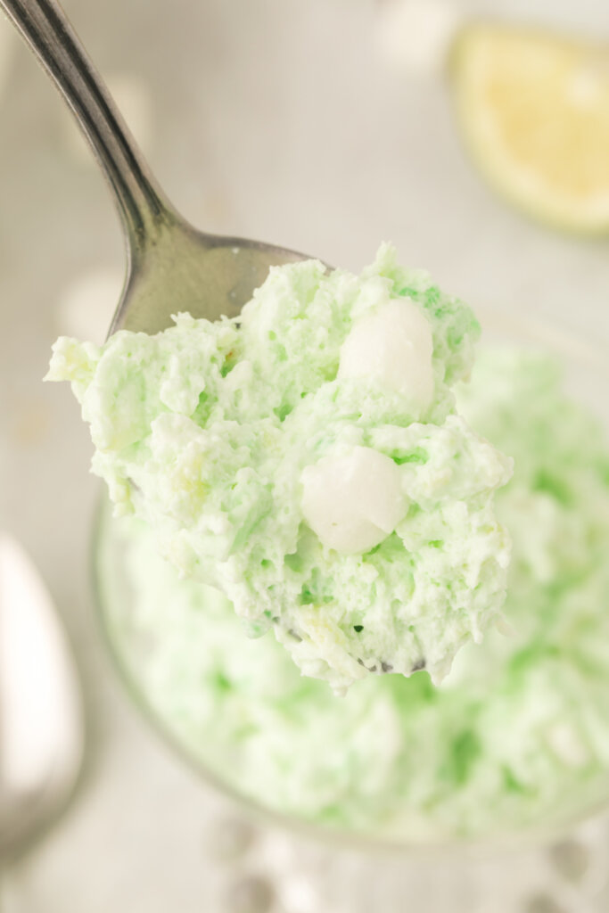 closeup of lime fluff salad on spoon