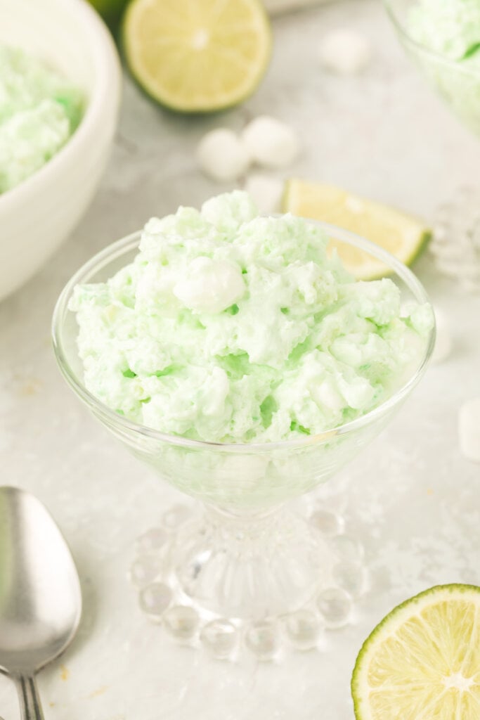 lime fluff sald in glass serving bowl