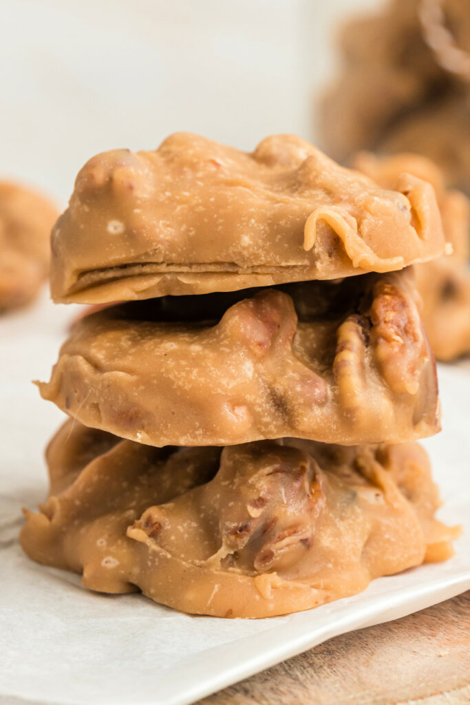 three pecan pralines stacked