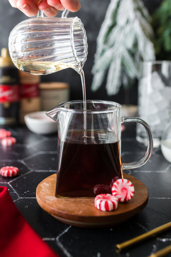 adding peppermint syrup to the coffee