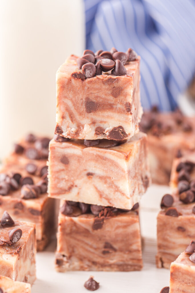 three pieces of cookie dough fudge stacked