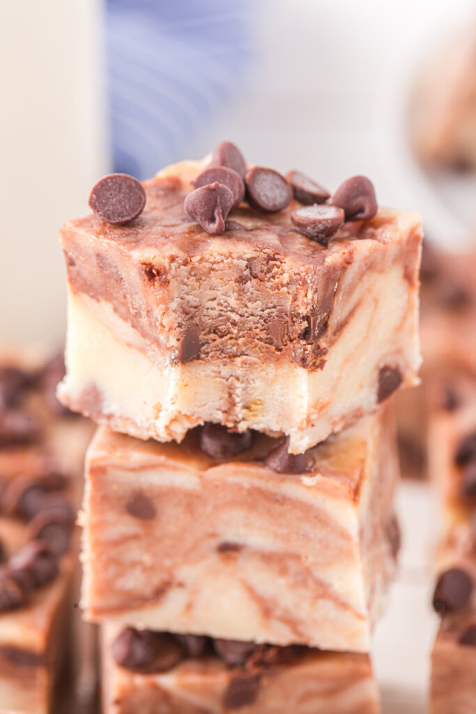 piece of bitten cookie dough fudge showing the inside texture of the fudge