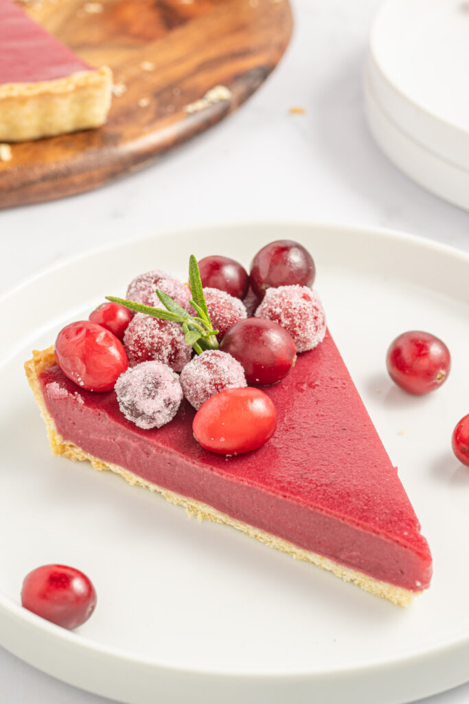 slice of cranberry curd tart on plate