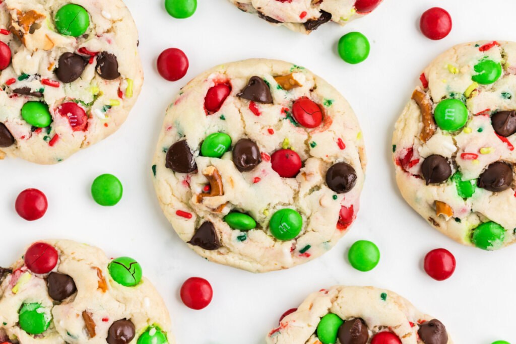 loaded christmas cookies spread out on table