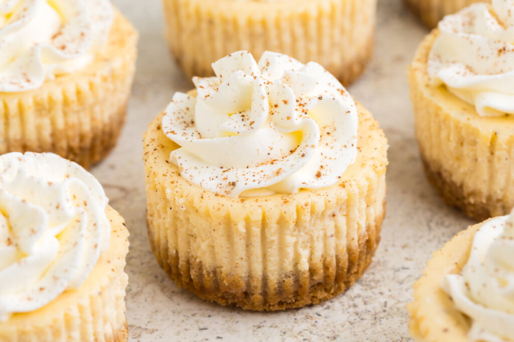 mini eggnog cheesecakes on table