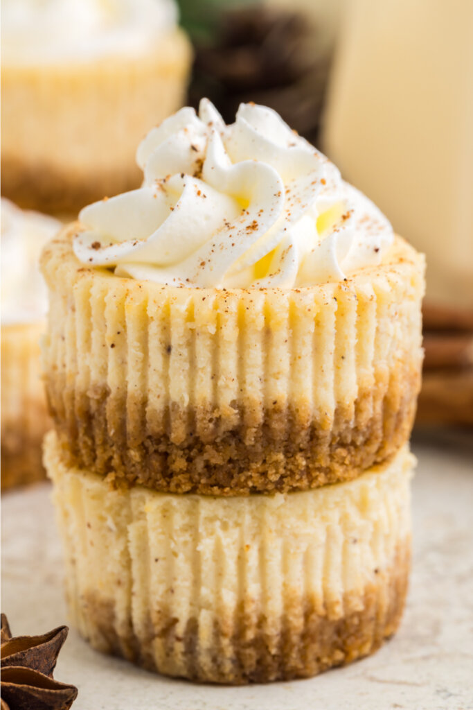 two mini eggnog cheesecakes stacked