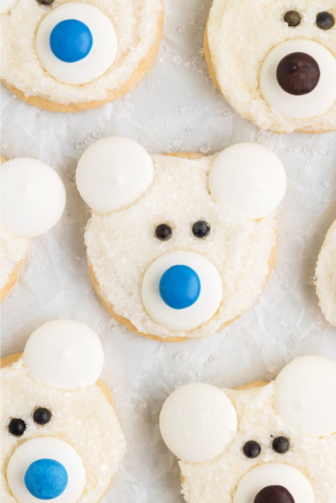 close up of finished polar bear face cookies on table