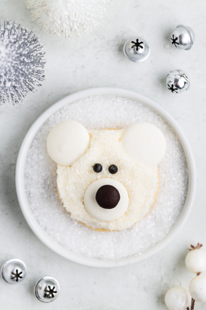 single polar bear face cookie on plate