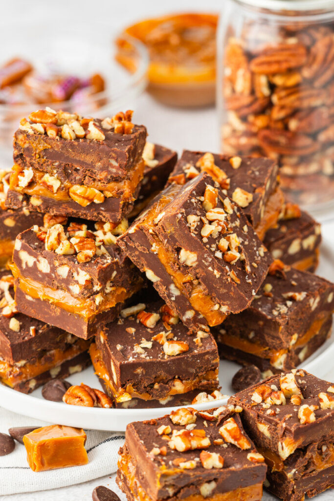 pieces of turtle fudge stacked on plate