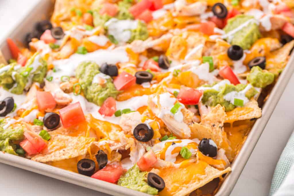 sheet pan filled with chicken nachos