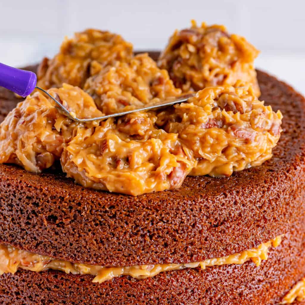 coconut pecan frosting on top of a cake