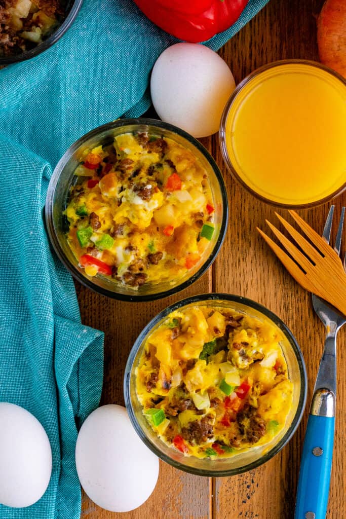 lookingdown on two bowl of cooked homemade just crack an egg