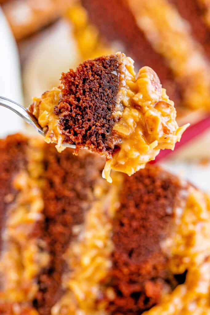 closeup of a bite of german chocolate cake on fork