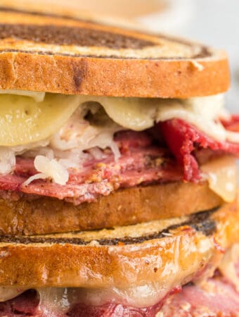 closeup of reuben sandwiches