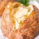closeup of a baked potato with butter