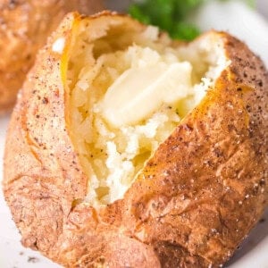 closeup of a baked potato with butter