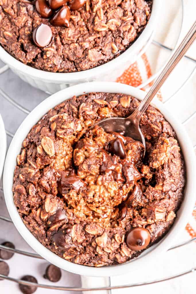 closeup looking down onto a bowl of brownie batter baked oatmeal