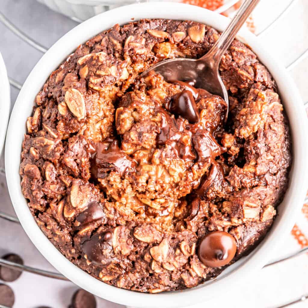 closeup of brownie batter baked oatmeal in ramekin