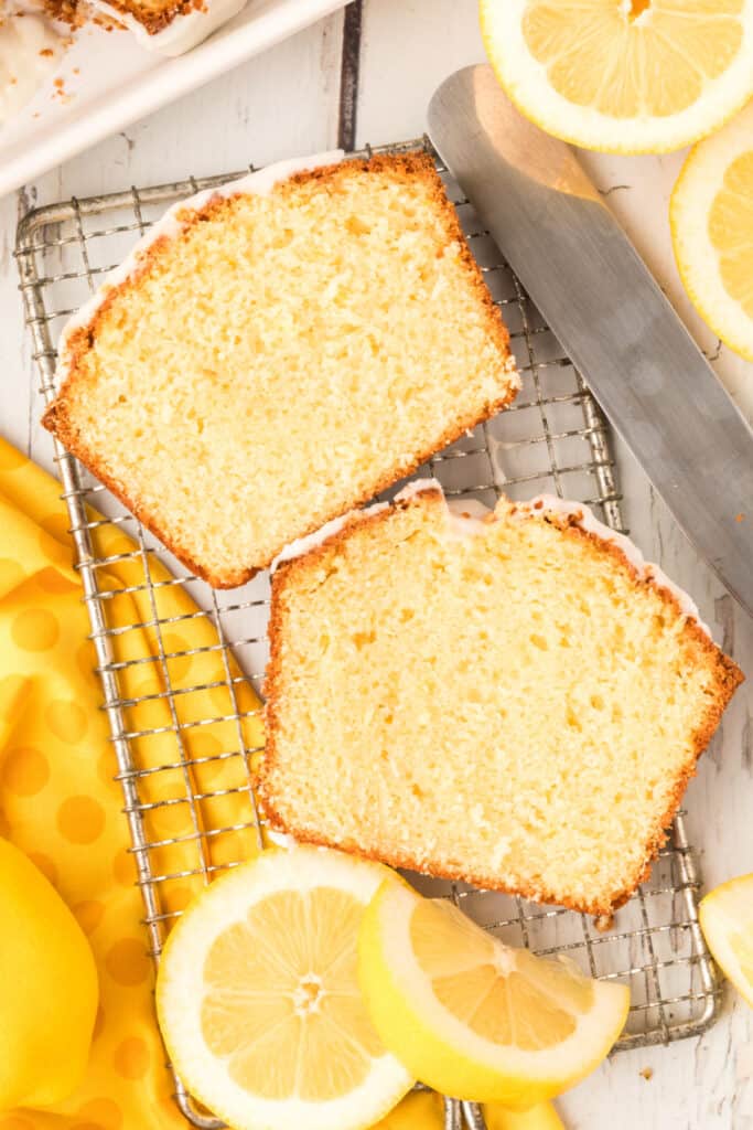 two slices of lemon loaf on cooling rack