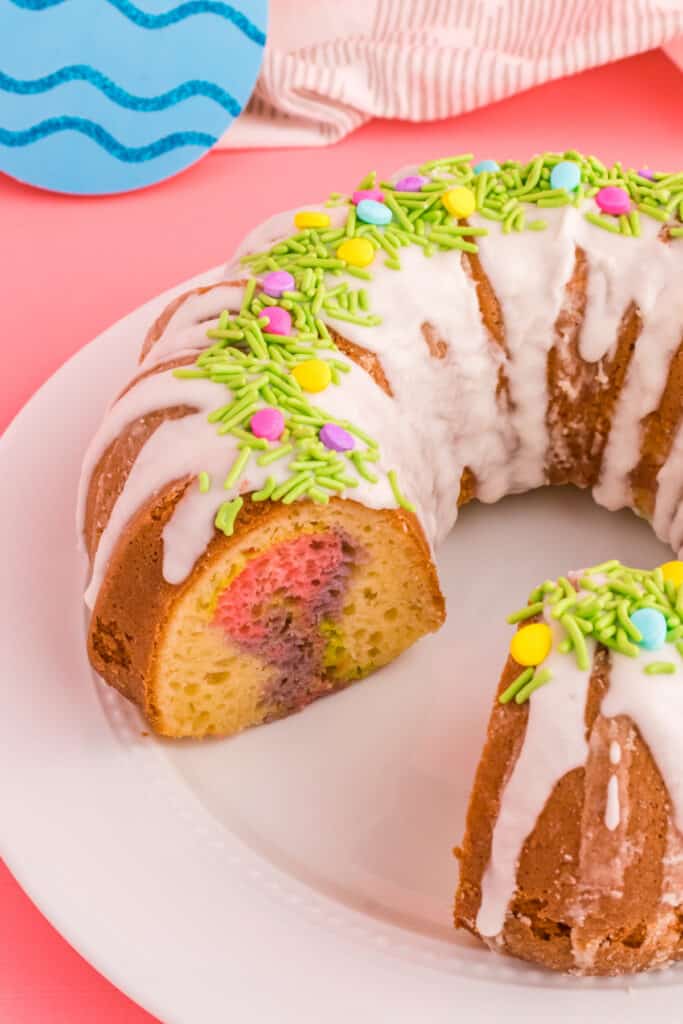 easter bundt cake on plate cut to show the swirl on the inside