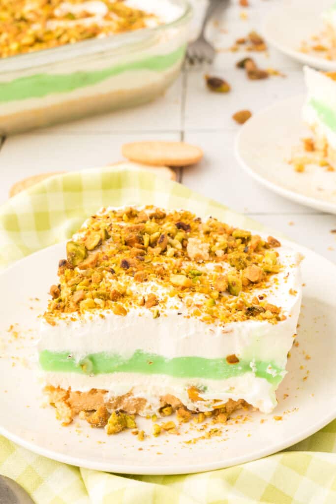 slice of pistachio lasagna lush dessert on a plate