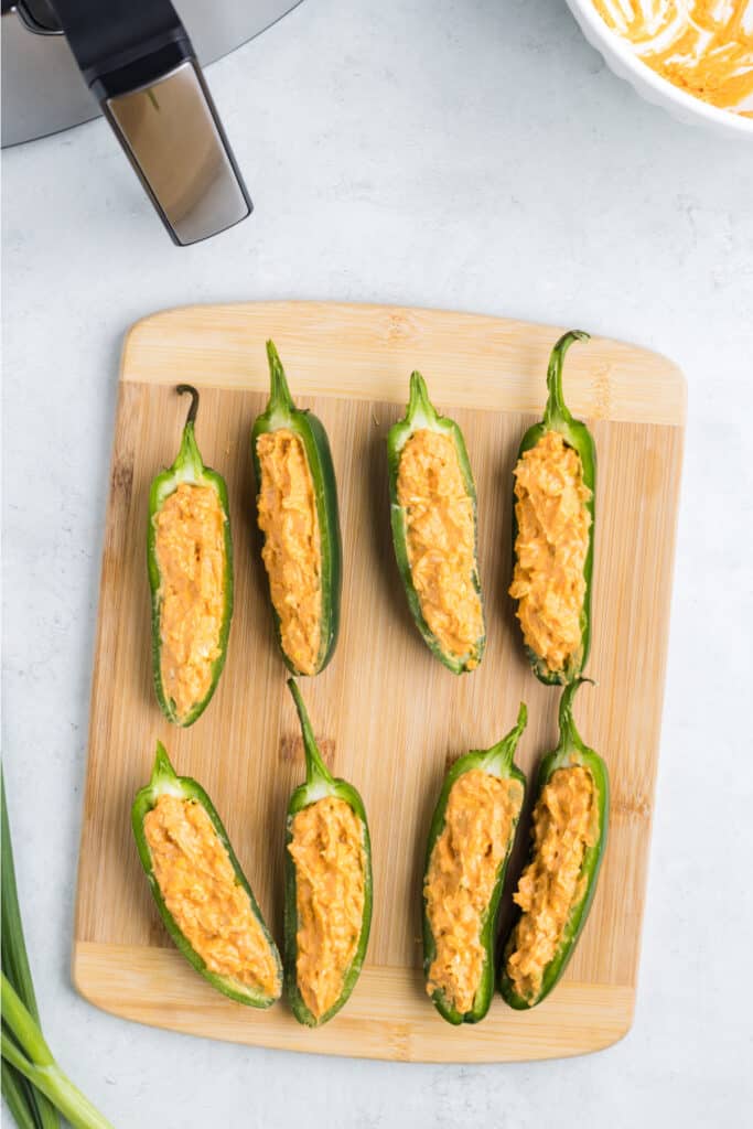 Fill each jalapeno half with the cream cheese mixture.