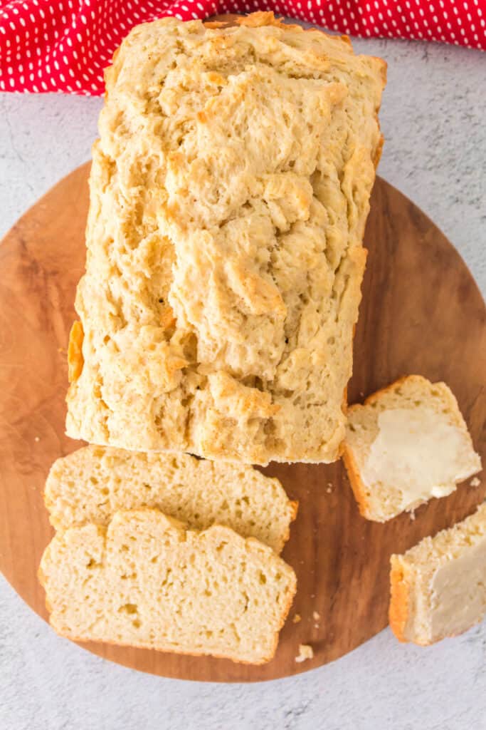 loaf of beer quick bread with slices cut