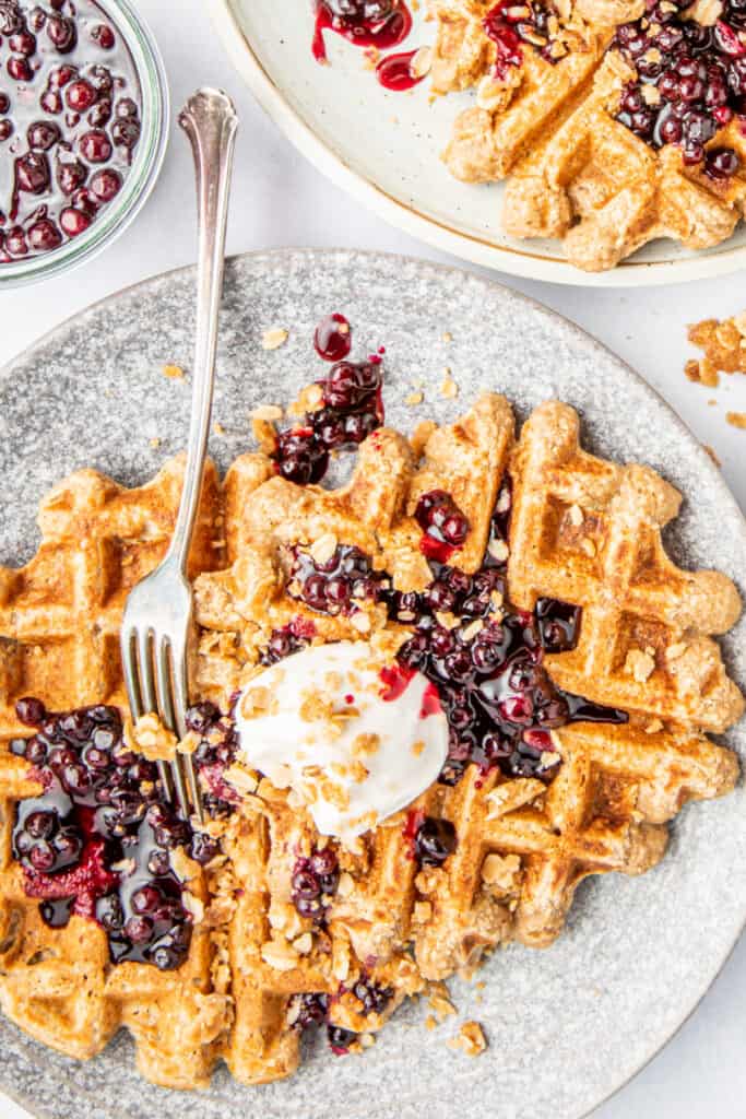 looking down onto blueberry cobbler waffles on plate