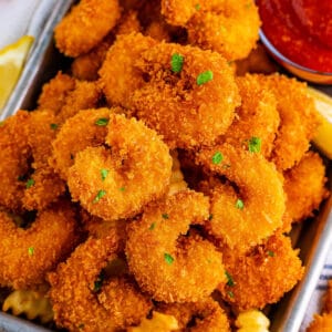 closeup of panko fried shrimp on plate