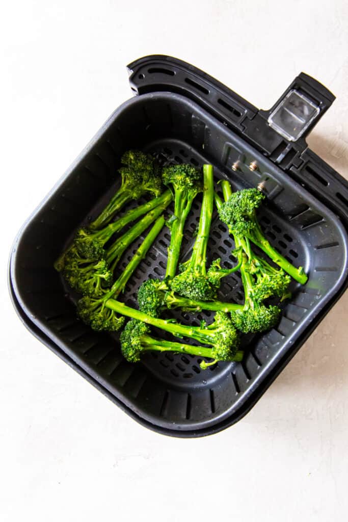 Transfer the broccolini to the air fryer basket. Make sure to place in a single later. 