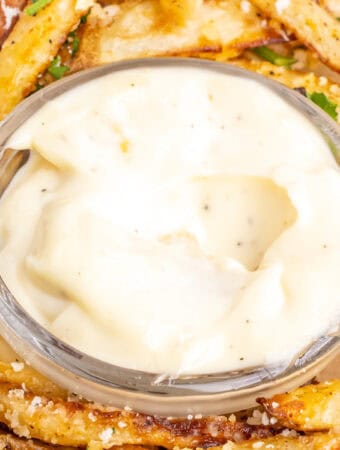 closeup of homemade garlic aioli in small bowl