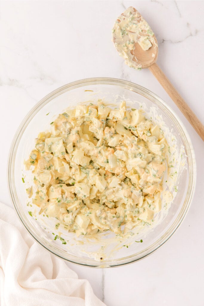 Herbed Egg Salad in bowl after being mixed