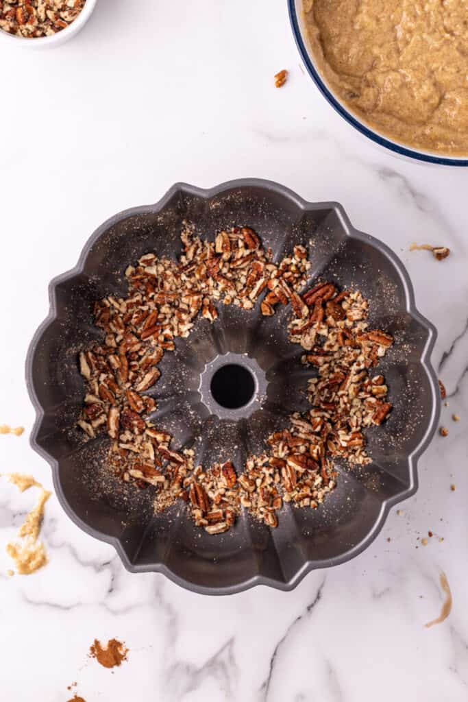 pecan on the bottom of the bundt pan before the batter is poured over