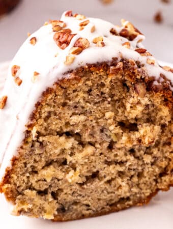 closeup of a slice of hummingbird bundt cake on plate