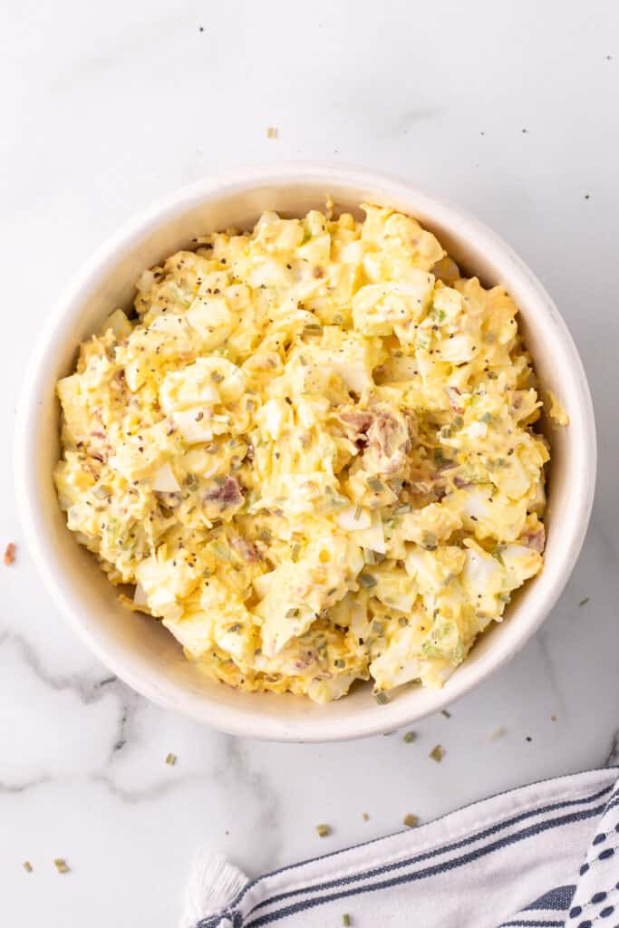 ingredients for million dollar egg salad in bowl after being mixed