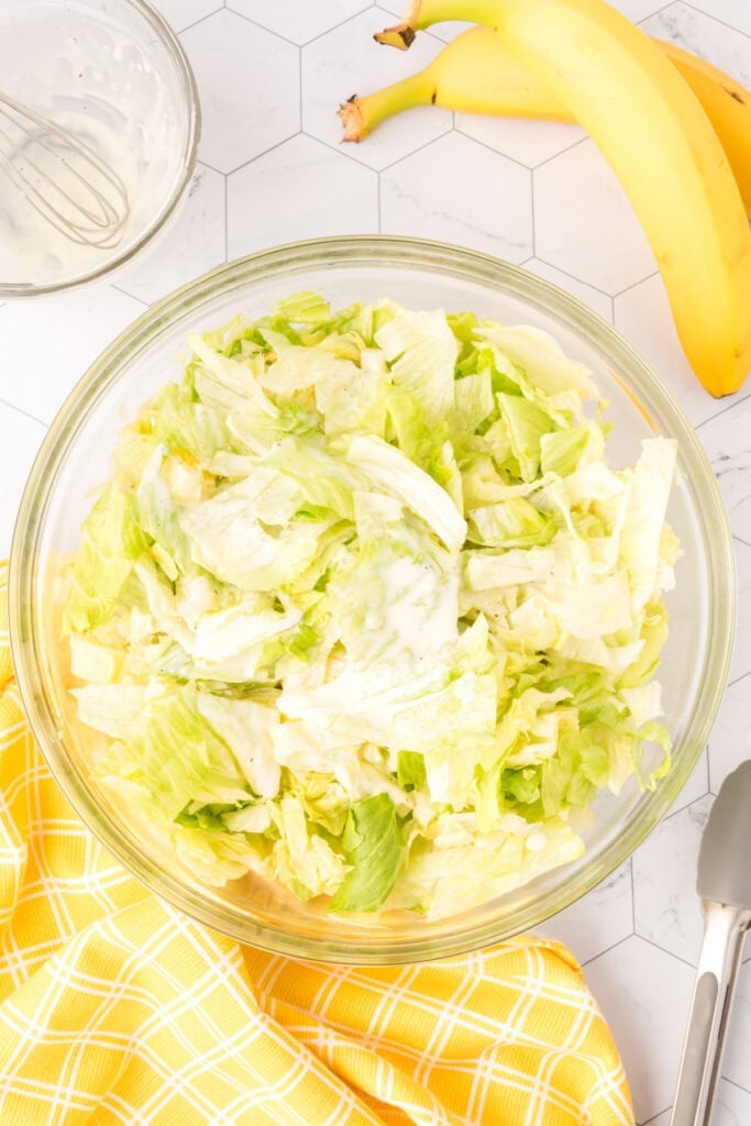 dressing mixed into the lettuce