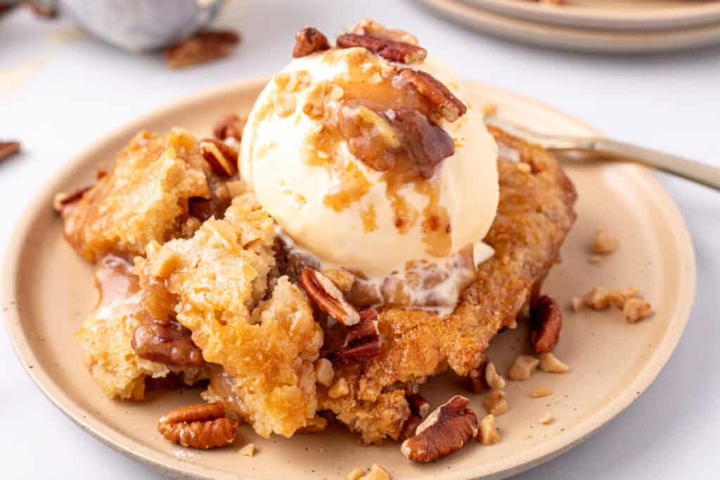 scoop of pecan pie cobbler on plate