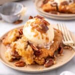 closeup of a scoop of pecan pie cobbler on plate