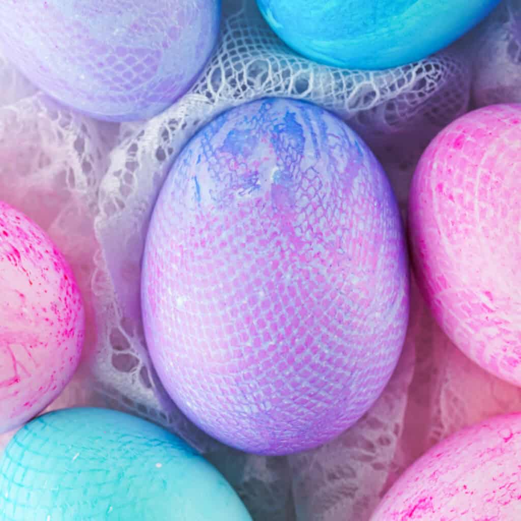closeup of assorted colors fabric textured easter eggs