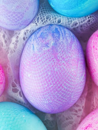 closeup of assorted colors fabric textured easter eggs