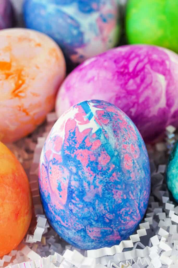 assorted colors of tissue paper dyed easter eggs