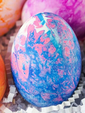 pink and blue tissue paper dyed easter egg