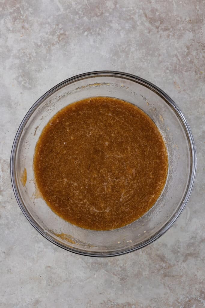 Wet ingredients fully mixed into a smooth and glossy batter.