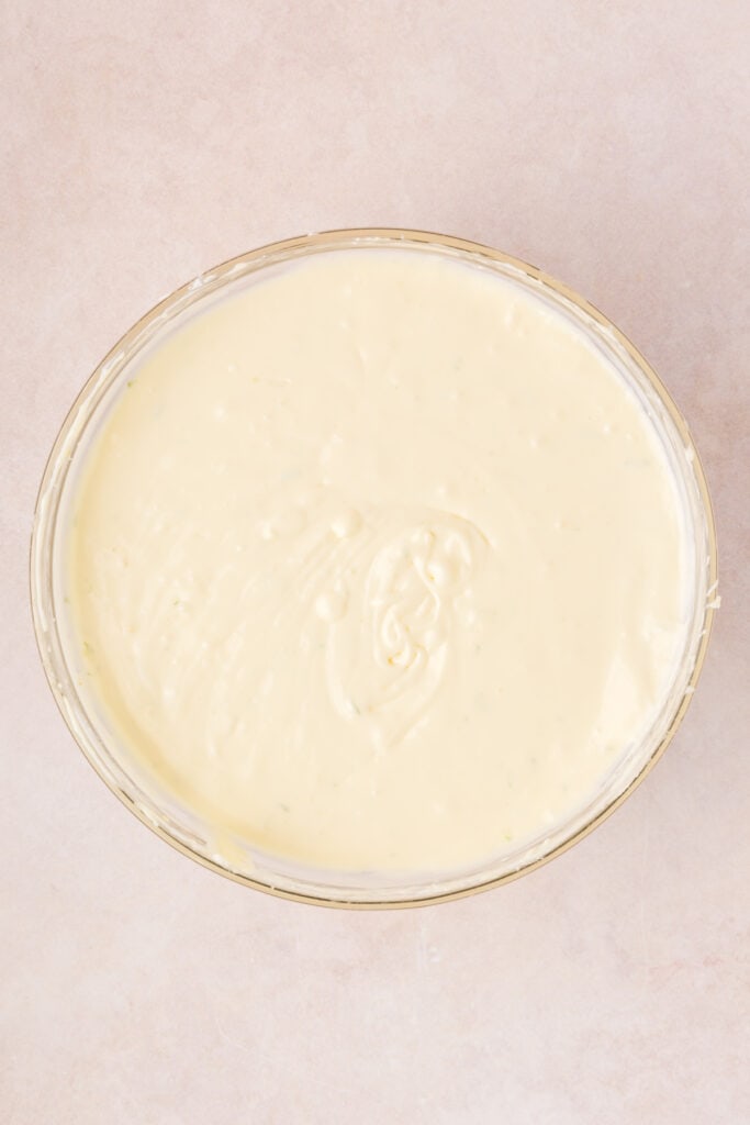 Fully blended Key Lime Cheesecake batter in a mixing bowl