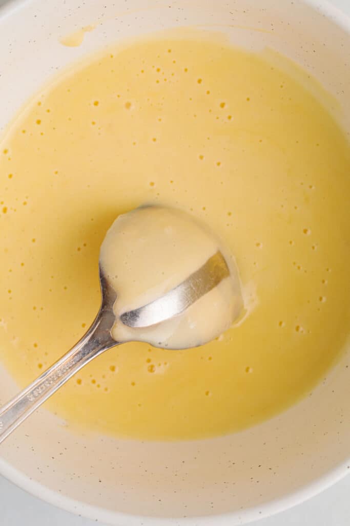 the sauce coating the back of a spoon