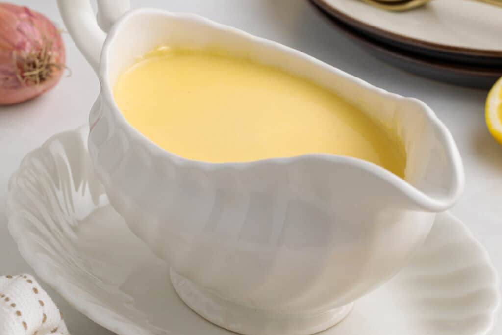 lemon butter sauce in gravy boat