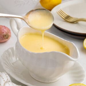 closeup lemon butter sauce in serving dish