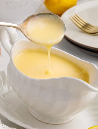 closeup lemon butter sauce in serving dish